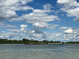 Scenic view of oil tanker transport on serene sunny day  