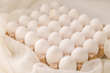 Farm white chicken delicious eggs in a large package