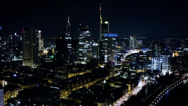 Aerial View Frankfurt skyscrapers financial district at night in 4k