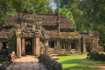 Fototapeta na wymiar Doorway to the rear courtyard of Ta Prohm temple ruins, located in the Angkor Wat complex near Siem Reap, Cambodia.