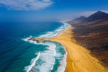 Fototapeta na wymiar Cofete beach, Fuerteventura, Canary Islans, Spain. Aerial drone view in october 2019