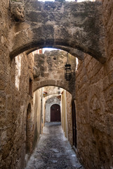 Fototapeta na wymiar The Jewish quarter in the old town of Rhodes. A Greek island with the oldest, still lived in, medieval city in Europe. Picture of the Jewish quarter, which has little tourism and is very quiet.