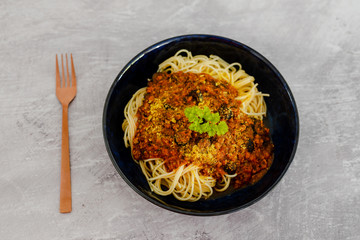 spaghetti bowl with vegan bolognaise sauce made with textured vegetable protein