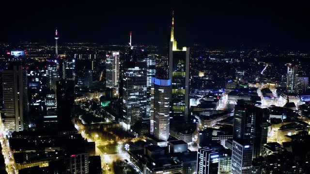 Aerial View Frankfurt skyscrapers financial district at night in 4k