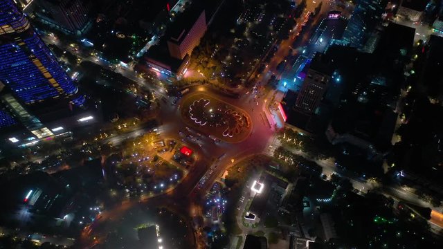 night illuminated nanjing city center traffic street circle tower aerial topdown panorama 4k china