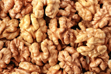 Many tasty walnuts as background