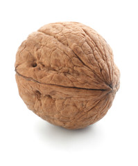 Fototapeta na wymiar Tasty walnut on white background