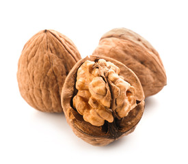 Tasty walnuts on white background