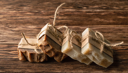 Eco friendly handmade soap bars on wooden background