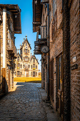 GONZALEZ CATAN, ARGENTINA, SEPTEMBER 28, 2019: cobblestone path through abandoned buildings in the...