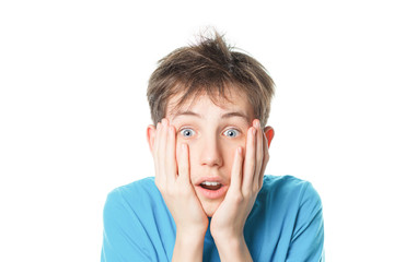 surprised boy holding his head white background