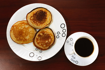 Coffee and Arepuelas made with wheat flour, breakfast on the table, Bogotá Colombia, February 13, 2020