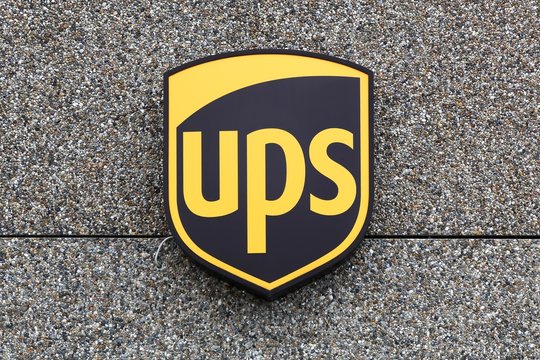 Holme, Denmark - June 5, 2019: UPS logo on a facade. United Parcel Service is the worlds largest package delivery company and a provider of supply chain management solutions