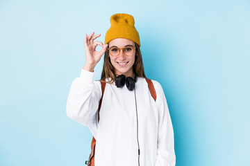 Young student woman isolated cheerful and confident showing ok gesture.