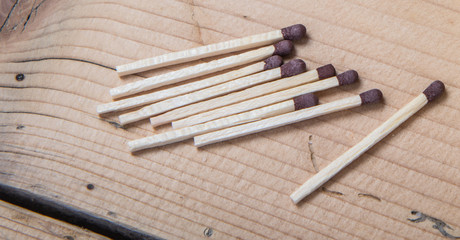Matches on a wooden table. macro.