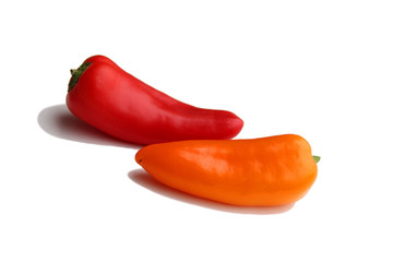 orange and red sweet bell pepper on a white isolated background, concept of fresh vegetables, vegan food, copy space for designer