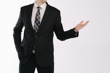 portrait of a businessman standing on a white background with his hand outstretched