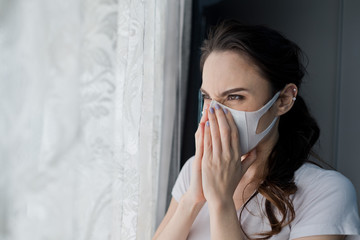 woman afraid of catching a cold, adult wearing dust mask, pm 2.5 dust