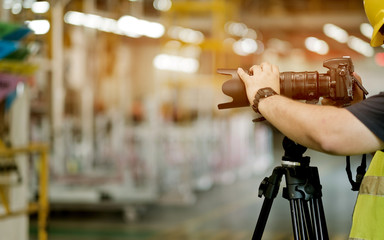videographer close up, cameraman, movie, man with camera, movie, professional camera - obrazy, fototapety, plakaty