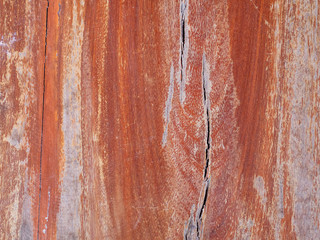 Cracked wood pattern line across a wooden background