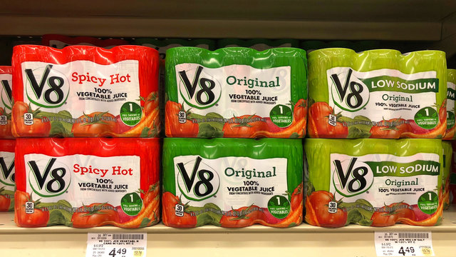 Alameda, CA - February 15, 2018: Grocery store shelf with V8 healthy green fruit and vegetable beverage. V8 is a popular juice brand owned by Campbell Soup Company.