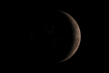 A little planet with light from the sun shining just a little from behind the right in the dark. 3D rendering