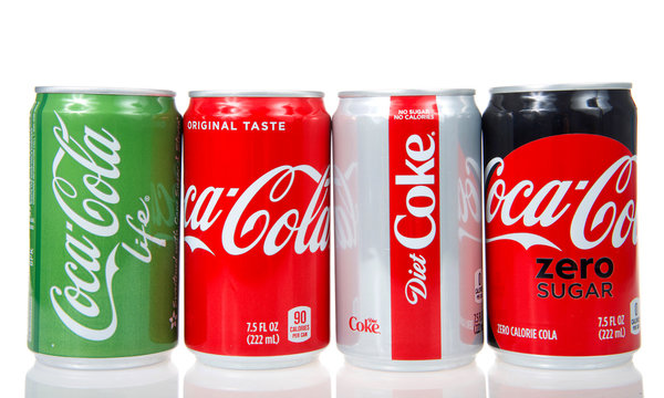 Alameda, CA - July 25, 2018:  New smaller 7.5 ounce cans of Coca Cola sodas, Isolated on white background. Coca-Cola is the most popular as well as one of the most recognizable brands in the world.
