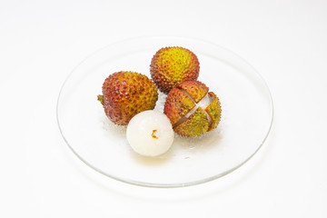 Fresh lychees on the white background