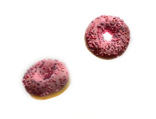 Donuts with pink icing and marshmellow. unhealthy food concept. Flying dougnuts on white background. 