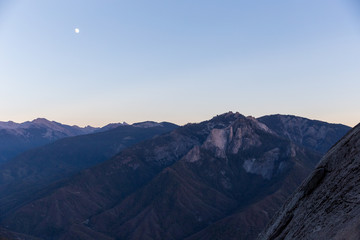mountain tops and moon at dusk in Sequoia National Forest, California