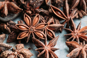 Dried anise stars on the rustic background. Selective focus. Shallow depth of field.