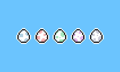 Pixel art cartoon dinosaur egg icon set.