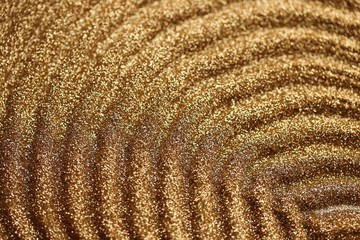 Gold pattern. Golden shine stripes pattern.Art deco glitter background.shiny gold texture.Glitter macro shimmer texture.Vibrant background with twinkle lights.