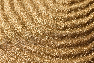Gold pattern. Golden shine stripes pattern.Art deco glitter background.shiny gold texture.Glitter macro shimmer texture.