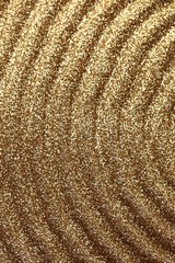 Gold pattern. Golden shine stripes pattern.Art deco glitter background.shiny gold texture.Vibrant background with twinkle lights.