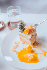 Delicious with mango cheesecake on a plate