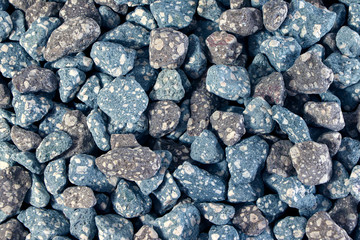 Granite texture, pattern. Stone, pebbles background. Crushed stone.