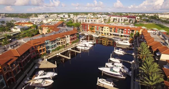 High Aerial shot of yachts at Colorful Marina in Naples Florida