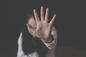 Stop violence against women.woman showing her denial with on her hand