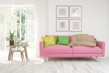 Stylish room in white color with sofa and summer landscape in window. Scandinavian interior design. 3D illustration
