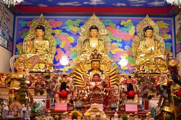 Fototapeta na wymiar Golden statue of buddha in temple, Thailand 
