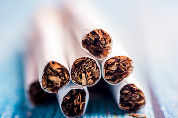 Close up of a smoking cigarettes. Pack of cigarette