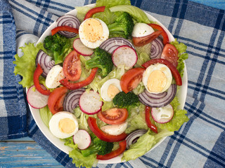 fresh salad of vegetables and herbs.