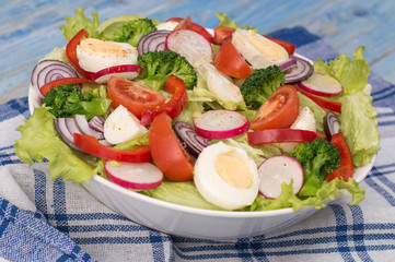fresh salad of vegetables and herbs.