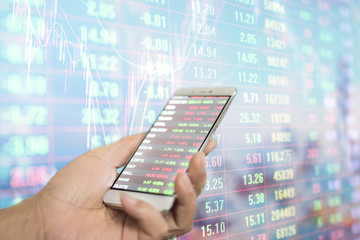 Holding mobile phone to see stock and stock background photos