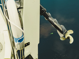 Propeller of boat on sea coast.