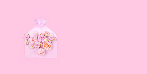 heart, flowers and envelope on pink background. Valentine's day, mother's day, birthday festive concept. banner. copy space