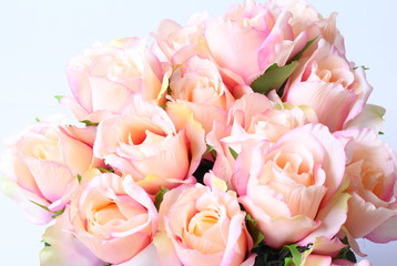 Bouquet of beautiful roses on white background