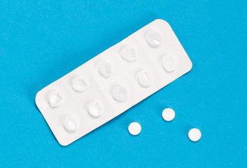 Pill strip on blue on background