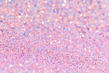 Delicate shiny background with pink and purple glitter